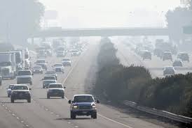 California freeway in smog and haze — the reason smog checks remain required